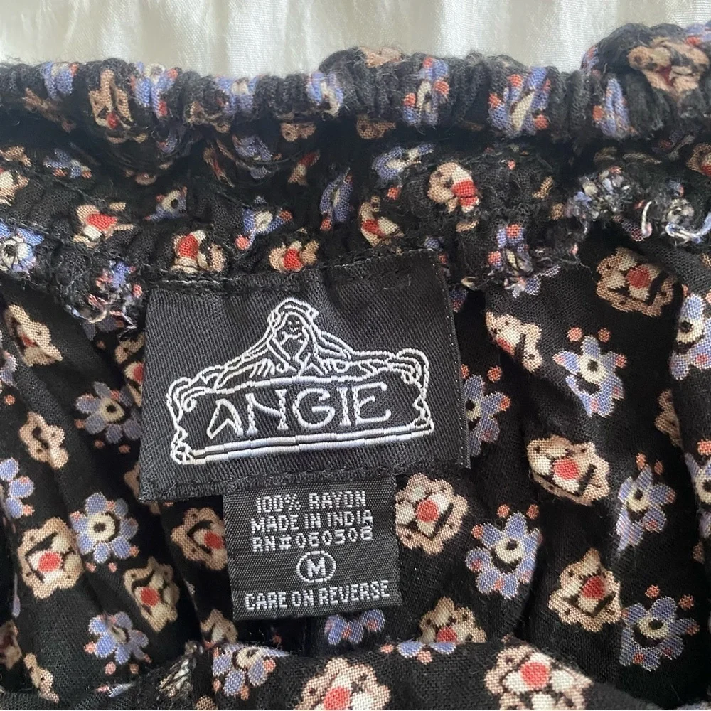 Nordstrom “Angie” Flowy black shorts with floral design size Medium